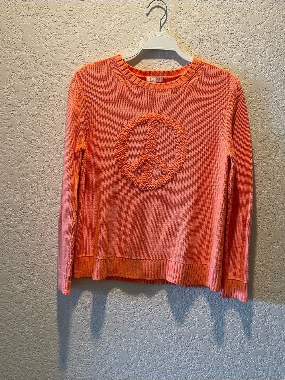 Lisa Todd orange sherbet colored “Peace” sign pullover sweater,size S